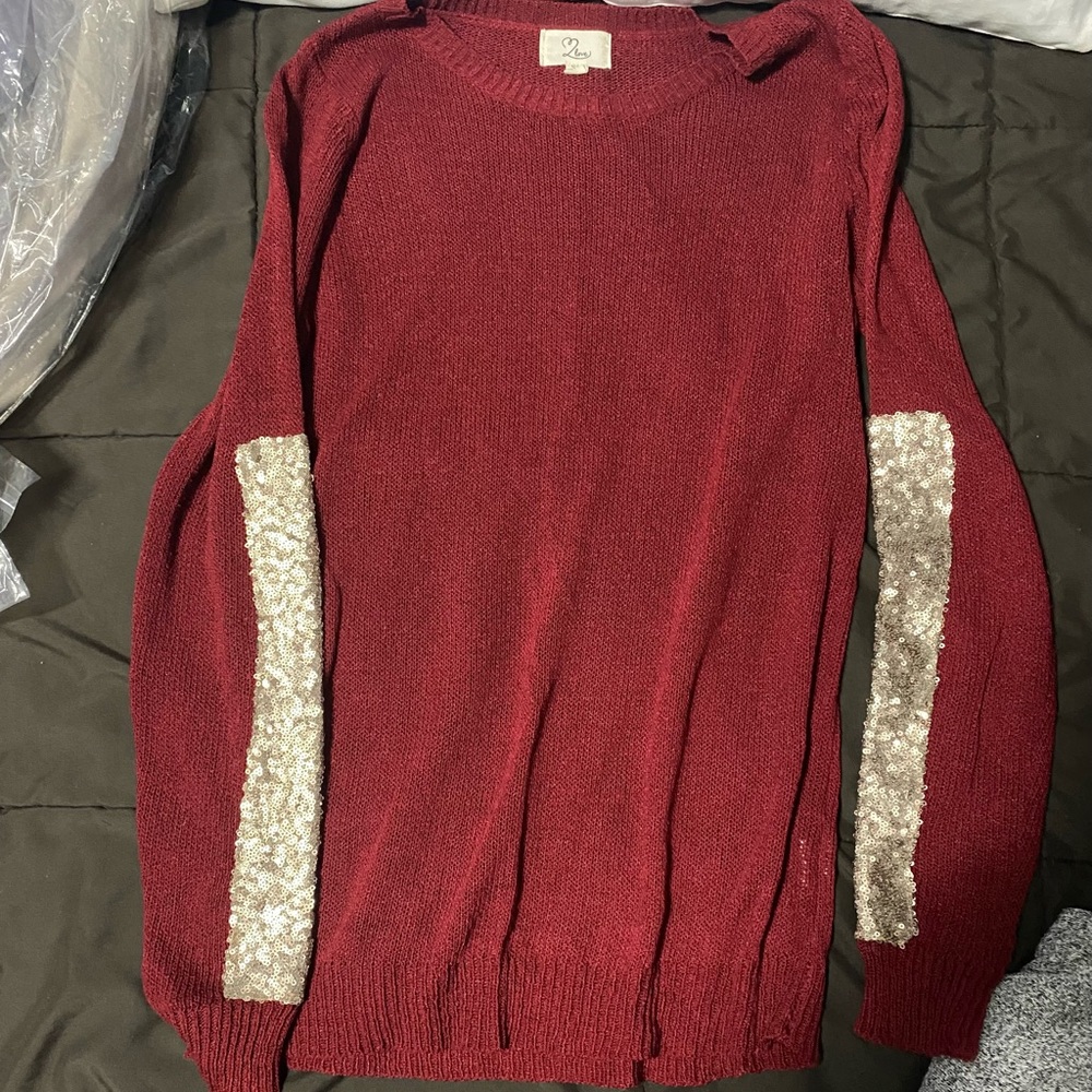Dark red sweater with gold